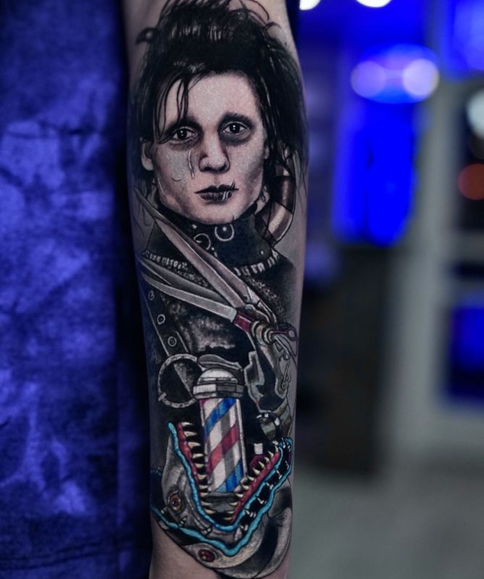 Color realism portrait tattoo on a forearm, done at Las Olas Tattoo Shop