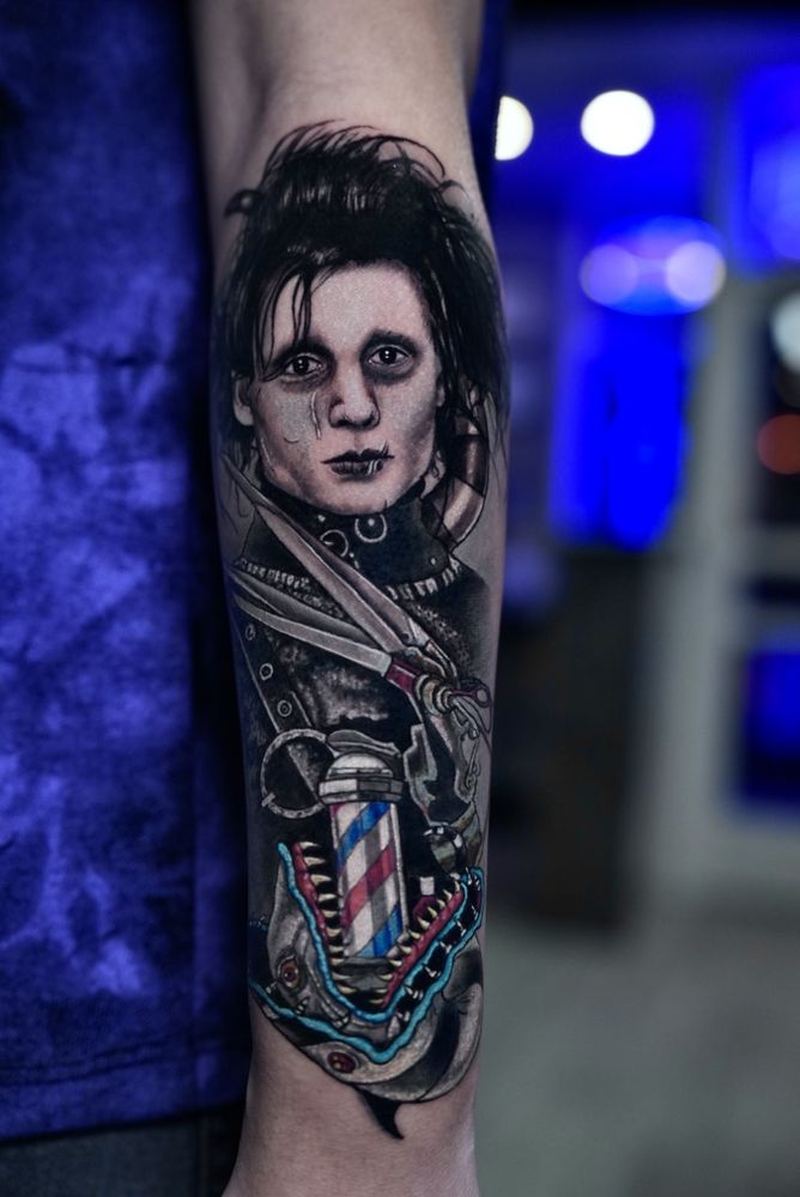 Color realism portrait tattoo on a forearm